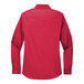 A red Port Authority long sleeve dress shirt for women.