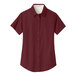 A Port Authority burgundy short sleeve dress shirt for women with white accents.