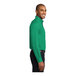 A man wearing a Port Authority Court Green long sleeve dress shirt.