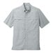 A close-up of a large Port Authority grey crosshatch plaid short sleeve shirt with white checks.