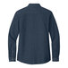 A Port & Company women's ink blue denim button-down shirt with short sleeves.