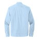 A Mercer+Mettle air blue long sleeve button down dress shirt.