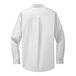 A Port Authority white long sleeve dress shirt.