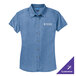 A medium faded blue Port & Company short sleeve denim button-down shirt with a logo on the front.