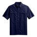 A navy blue Port Authority short sleeve shirt.