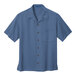 A medium blue Port Authority short sleeve shirt with a buttoned collar and a pocket.