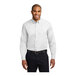 A man wearing a white Port Authority long sleeve poplin dress shirt.