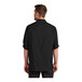 A man wearing a black Port Authority long sleeve shirt.