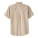 A back view of a Port Authority stone short sleeve dress shirt.