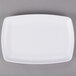 A white rectangular melamine tray with a white rim.