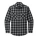 A Port Authority long sleeved flannel shirt in black and grey plaid with a pocket.