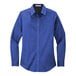 A Port Authority women's long sleeve poplin shirt in royal blue and classic navy.