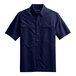 A navy blue Port Authority short sleeved shirt.