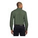 A man wearing a Port Authority clover green long sleeve dress shirt.