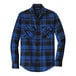 A close up of a Port Authority blue and black plaid flannel shirt.