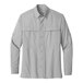 A Port Authority long sleeve grey shirt with a button down collar.
