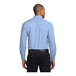 A man wearing a light blue Port Authority dress shirt.