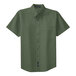 A close-up of a Port Authority clover green short sleeve dress shirt with a button up collar.