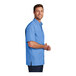 A man wearing a Port Authority mini plaid short sleeve shirt in blue and white.