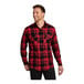 A man wearing a Port Authority red and black plaid flannel shirt.