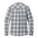 A back view of a grey and white plaid Port Authority flannel shirt.