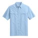 A light blue Port Authority short sleeve shirt.