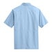 A light blue Port Authority short sleeve shirt with two pockets.