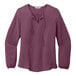 A purple Port Authority short sleeve blouse.