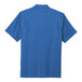 A Port Authority True Blue short sleeved performance staff shirt.