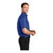 A man wearing a Port Authority royal blue short sleeve dress shirt.