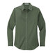 A Port Authority women's long sleeve green poplin dress shirt.
