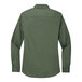 A Port Authority women's green long sleeve dress shirt.