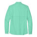 The back view of a bright seafoam short sleeve shirt.