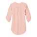 A rose quartz Port Authority blouse with ruffled short sleeves.