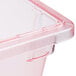A red Carlisle StorPlus food storage container with a lid.