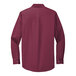 A Port Authority burgundy and light stone dress shirt with long sleeves.