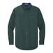 A Port Authority dark green and navy long sleeve dress shirt with a button up.
