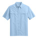 A light blue Port Authority short sleeved shirt.