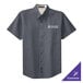 A Port Authority steel gray short sleeve button up dress shirt.