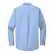 A close-up of a Port Authority light blue long sleeve dress shirt.