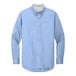 A Port Authority light blue long sleeve dress shirt.