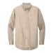 A Port Authority long sleeve tan button down dress shirt.