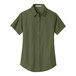 A close-up of a Port Authority women's clover green short sleeve shirt.