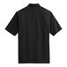A Port Authority black short sleeved shirt.