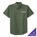 A Port Authority clover green short sleeve dress shirt with white text.