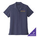 A women's Port Authority short sleeve navy shirt with gold embroidery of a logo.