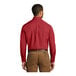 A man wearing a Port Authority rich red long sleeve poplin dress shirt.