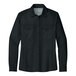 A black short sleeve Port Authority shirt.