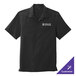 A black Port Authority short sleeve staff shirt with a logo on the front.
