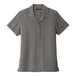 A graphite Port Authority short sleeve staff shirt for women with buttons.